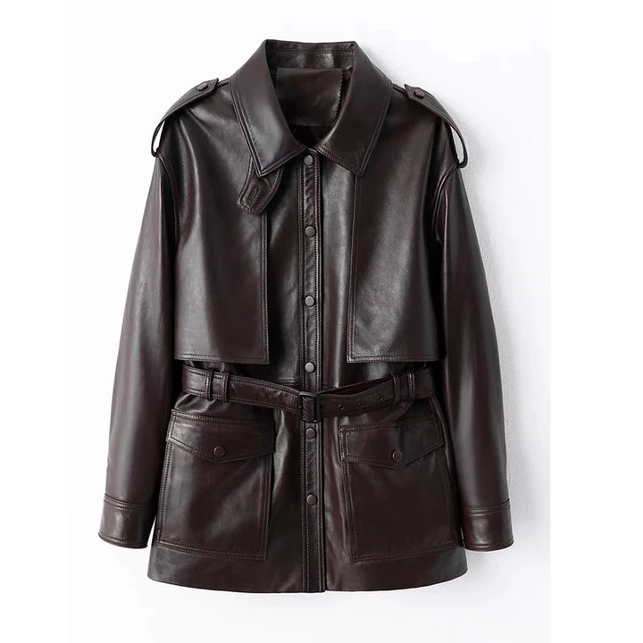 Dark brown leather coat with point collar, snap buttons, shoulder straps, and waist belt