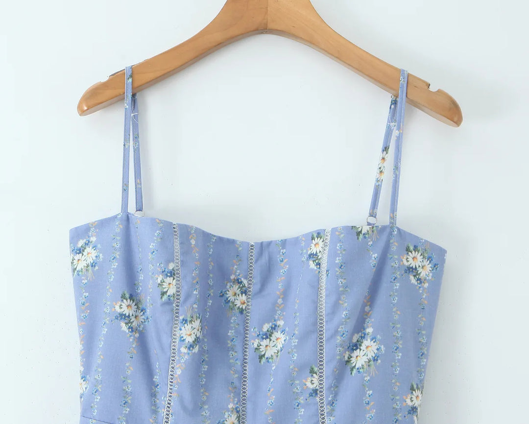 Blue daisy-print sundress with wide straps and square neckline