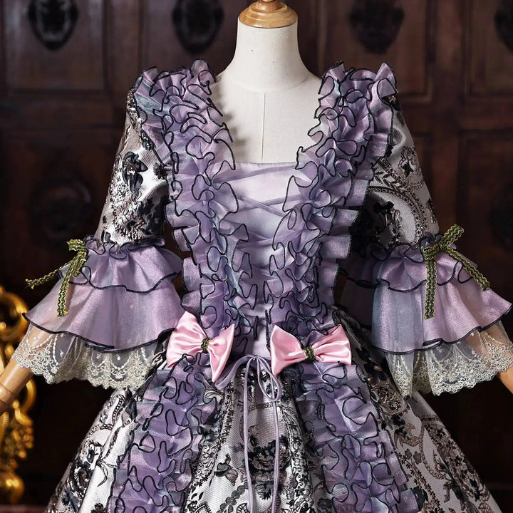 Purple Victorian-style lace stage dress with layered ruffle sleeves and corset bodice