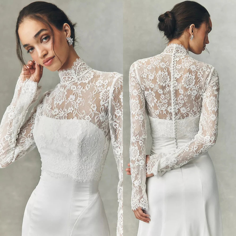 White lace bridal jacket with high neck and long sleeves, floral texture over fitted bodice