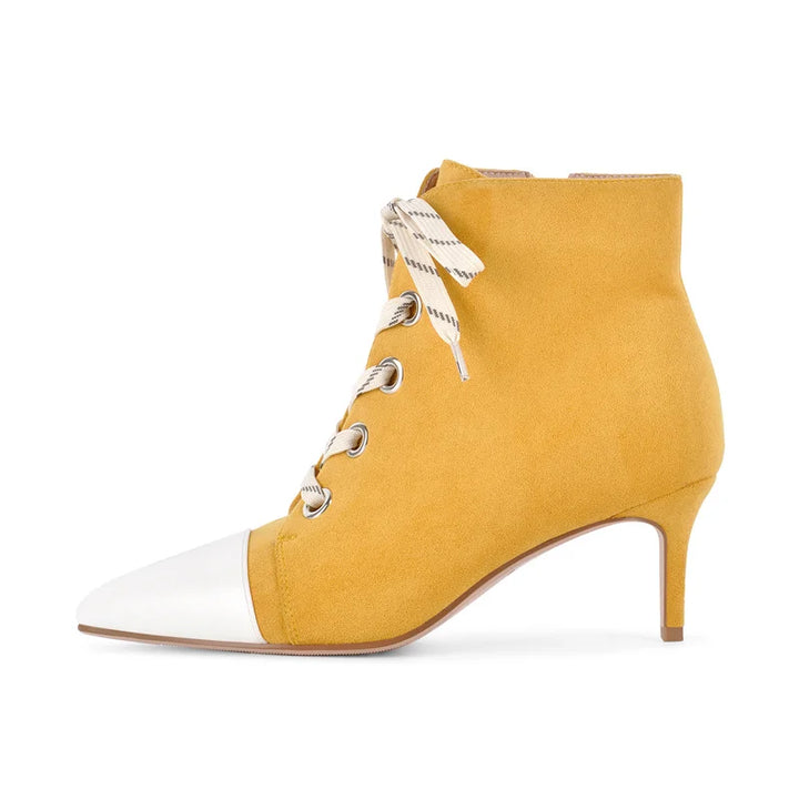 Yellow faux suede lace-up ankle boot with white laces and small block heel