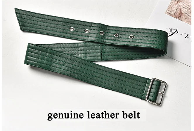 Green leather belt with buckle and eyelets for a skirt waistband