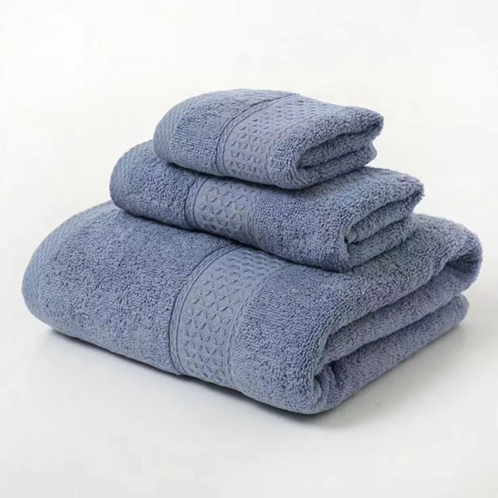Blue organic cotton towel set, 3-pc folded stack with textured weave and stitched bands