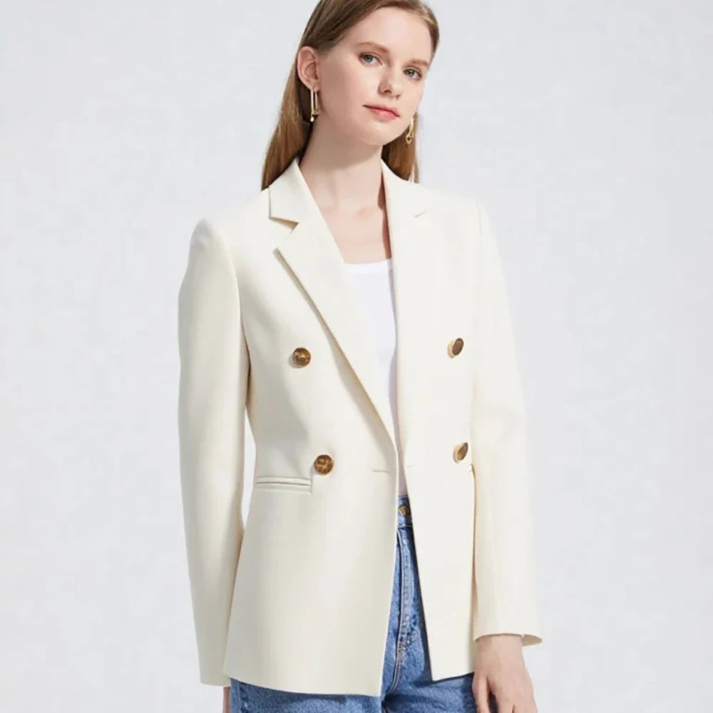White women’s blazer with turn-down collar, gold buttons, and structured shoulders