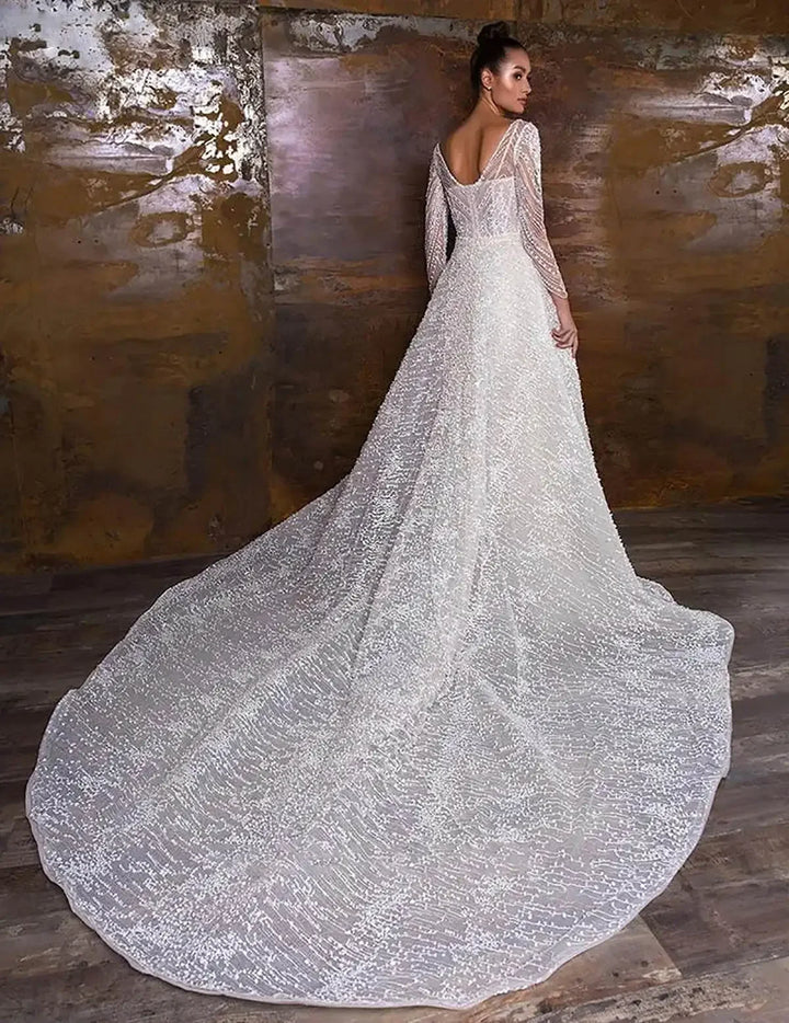 Superbe robe de mariée à paillettes avec traîne amovible