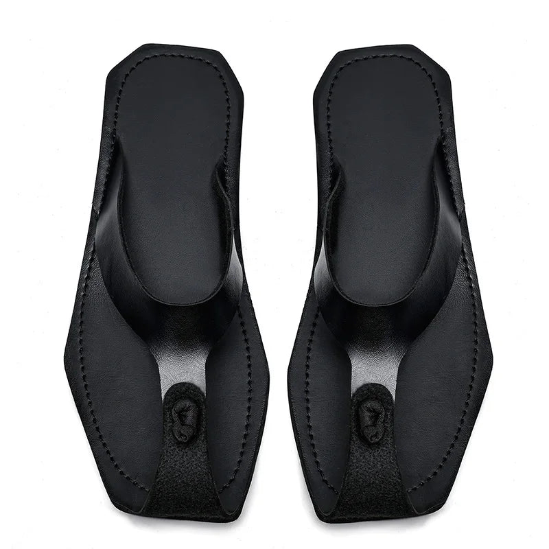 Black genuine leather men’s flip flops with stitched thong straps