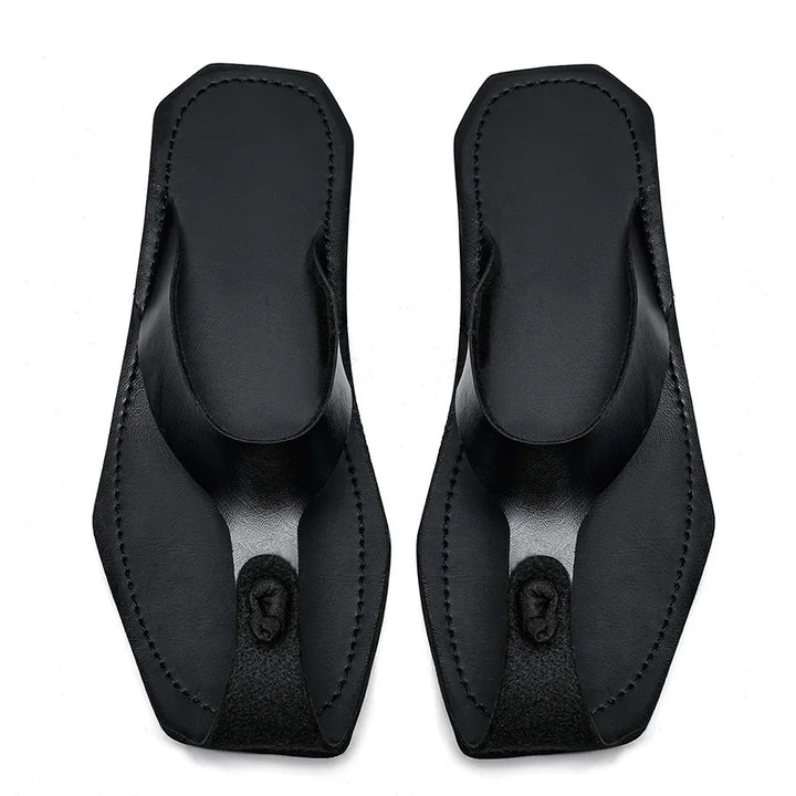 Black genuine leather men’s flip flops with stitched thong straps