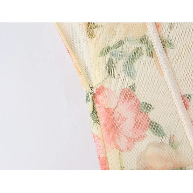Floral print sheer bodice panel with pink blooms and green leaves on a light base