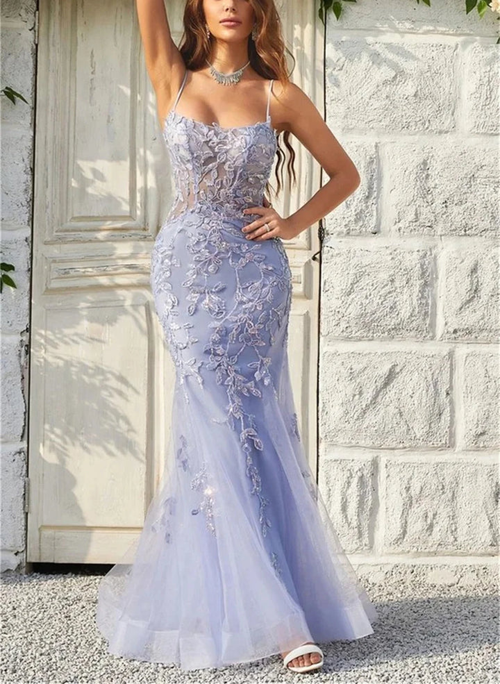 Embroidered lavender tulle formal gown with spaghetti straps and fitted mermaid silhouette