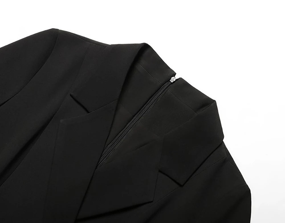 Black blazer-style midi dress shoulder and lapel detail with structured seam