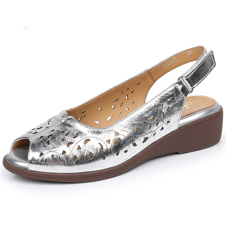 Silver open-toe genuine leather flat sandal with perforated vamp and low wedge sole