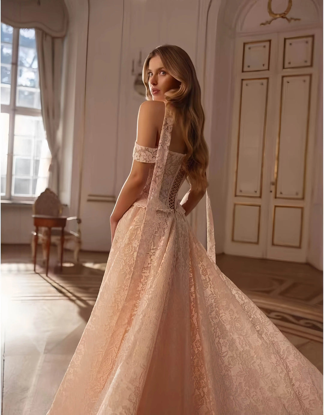 Champagne beige lace bridal dress with off-shoulder neckline and lace-detailed bodice