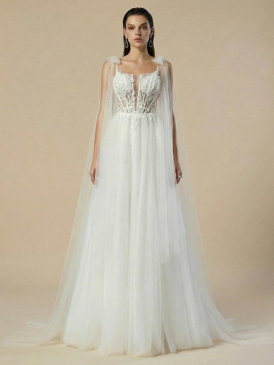 White shiny mesh wedding dress with lace bodice and long sheer cape sleeves