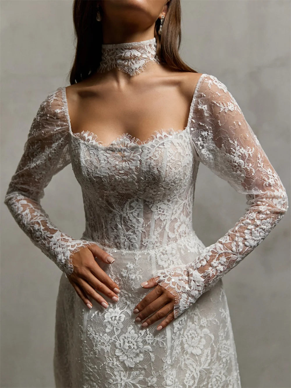 White lace bridal mini dress bodice with off-shoulder neckline and long sleeves