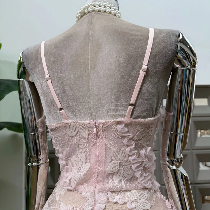 Pink lace corset mini dress back with lace overlay and thin pink ribbon straps