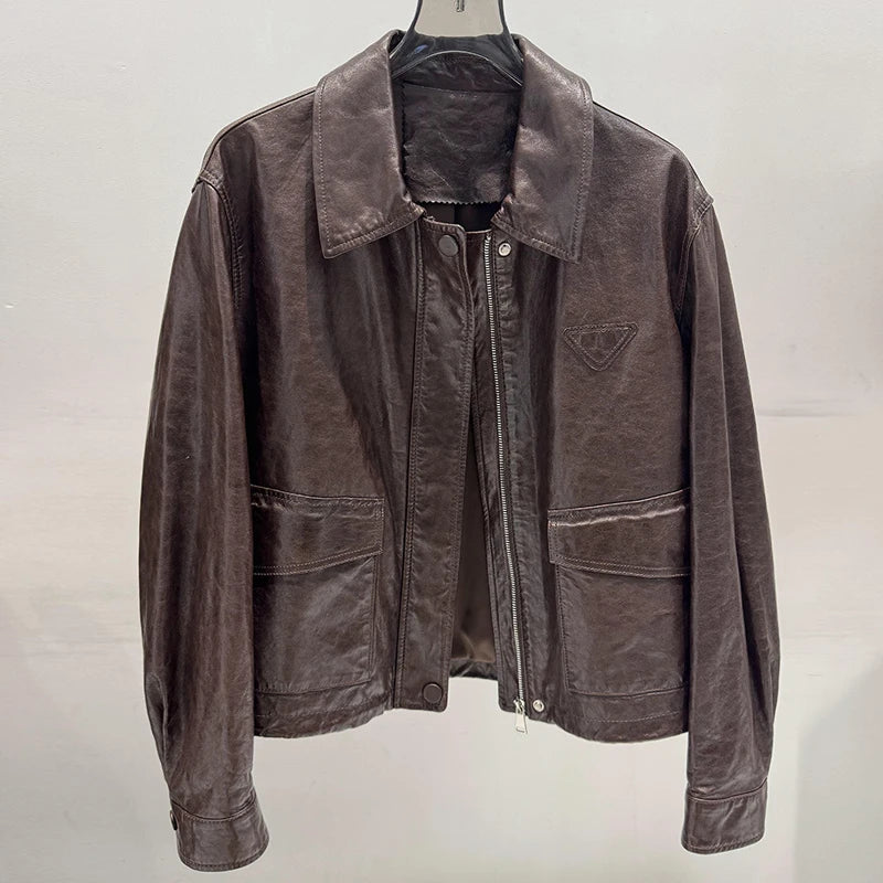Women’s distressed leather jacket, notch lapel, front zipper, chest pockets