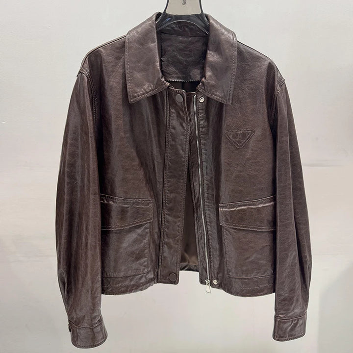 Women’s distressed leather jacket, notch lapel, front zipper, chest pockets
