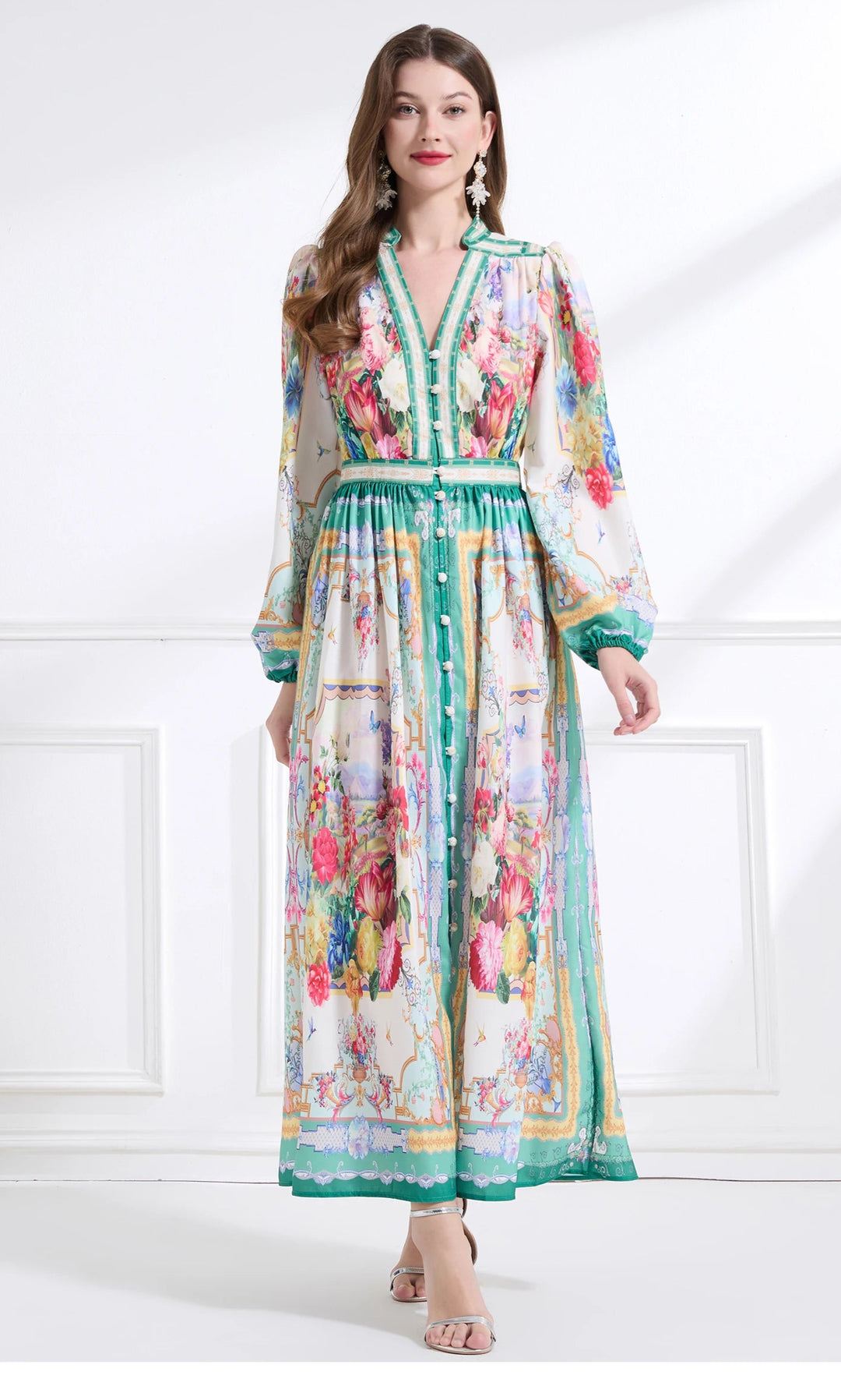 Woman wearing a colorful floral dress on a white background