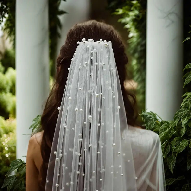Ivory tulle veil with pearl clusters along vertical lines, back view