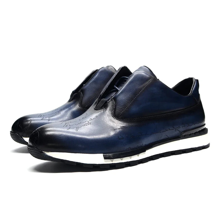 Pair of black leather shoes with white soles on a white background