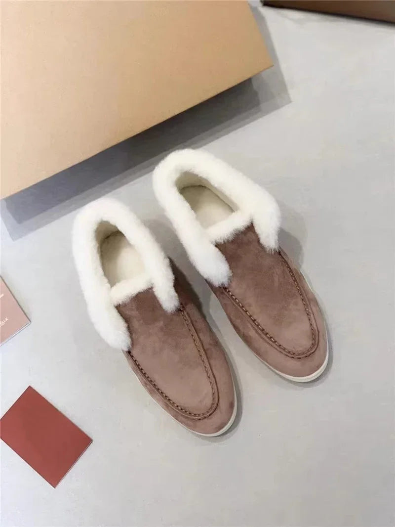 Brown fur-lined leather loafers with white faux-fur strap detail