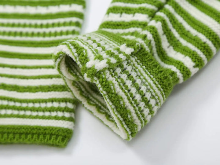 Green and white striped knit cardigan corner view with ribbed cuffs and sleeve