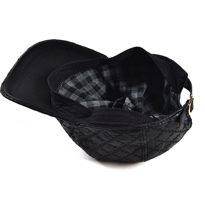 Black men’s cap open view showing inner checkered lining and curved brim