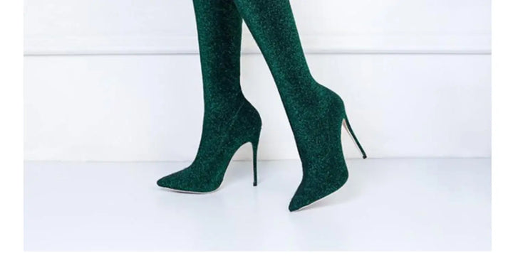 Women’s thigh-high stretch boots in dark green with pointed toe and stiletto heel
