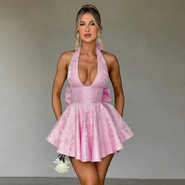 Floral embroidered mini A-line dress in light pink, halter neck, deep V, ruffled skirt