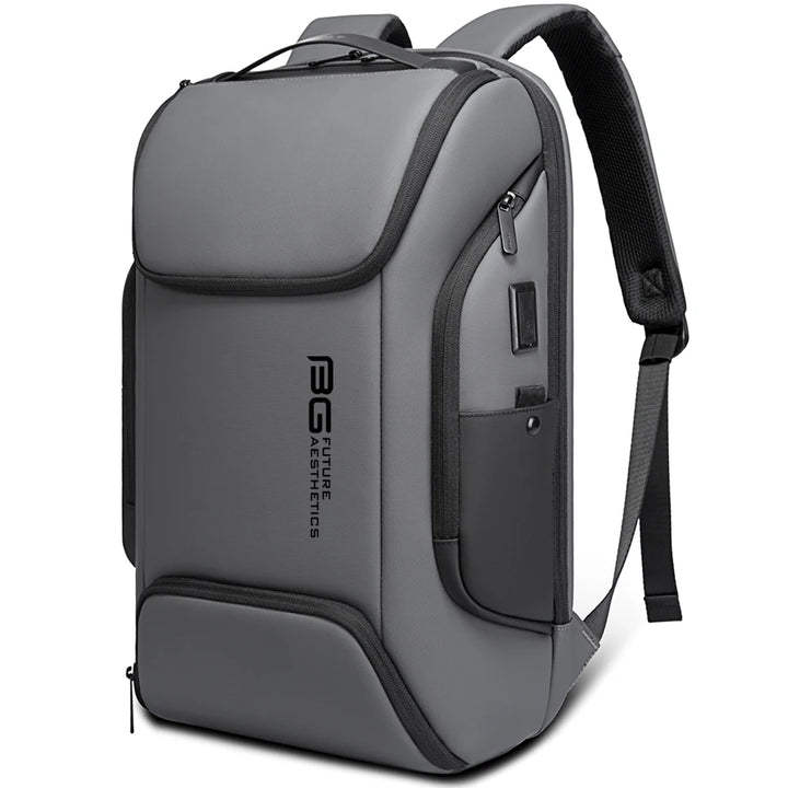Grey waterproof business backpack with top carry handle front logo and zip compartments