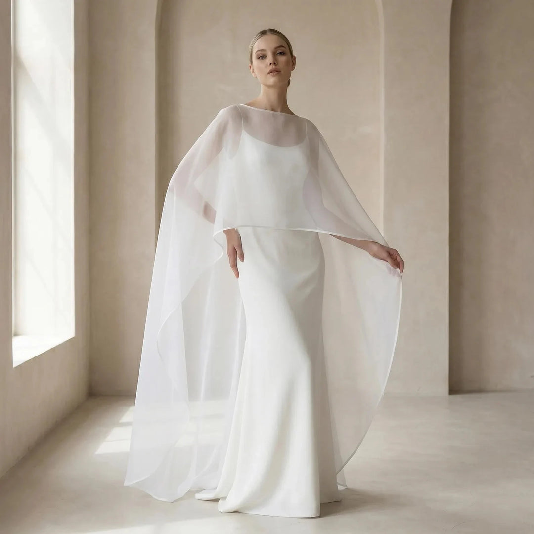 White organza bridal cloak with wide draped sleeves and round neckline