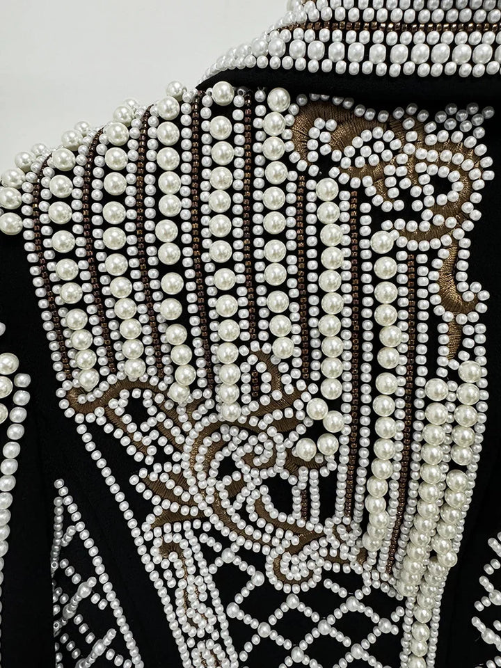 Black velvet cropped jacket back with vertical pearl bead stripes and swirl motifs