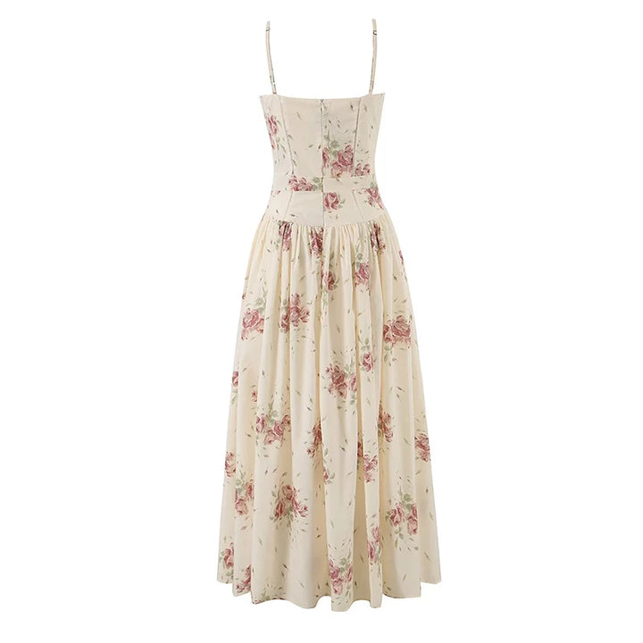 Cream floral print maxi dress with spaghetti straps and pleated skirt
