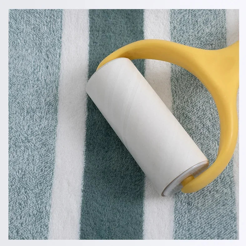 Green-and-white striped towel fabric with yellow loop handle