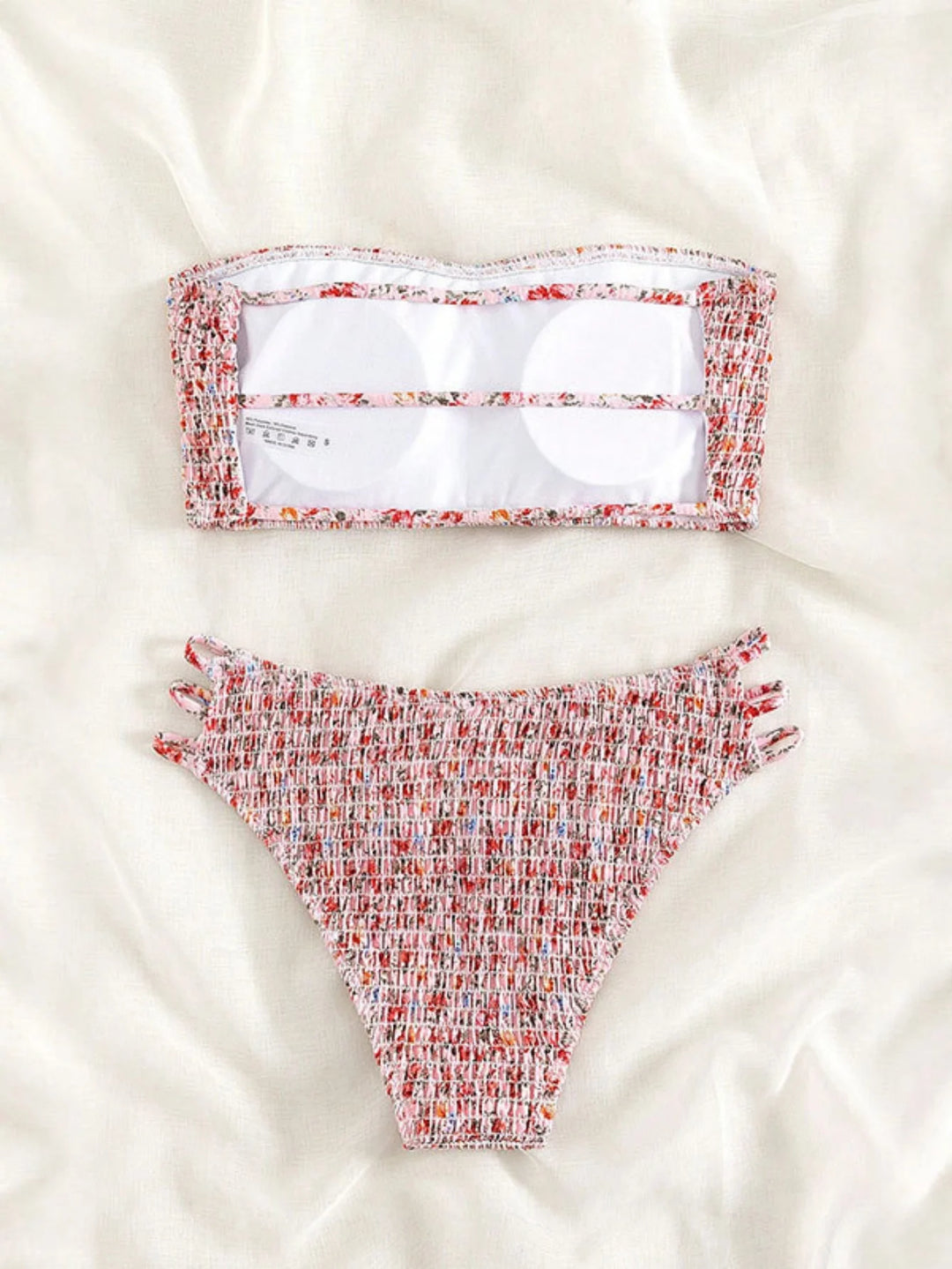Red floral patterned bandeau bikini set with high-waist bottoms