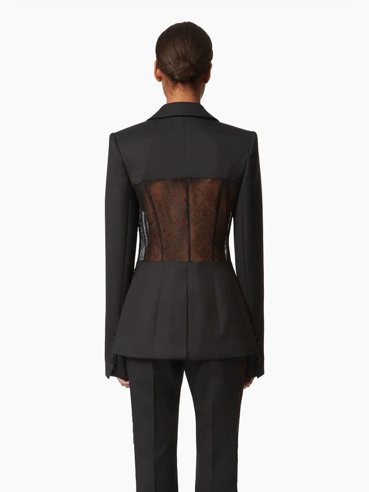 Black women’s blazer with sheer lace back panel and tailored peplum waist