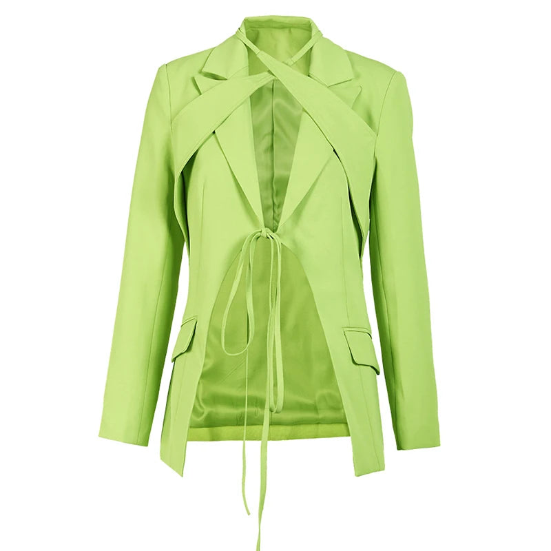 Green slim blazer on mannequin with lace-up back ties and side flap pockets