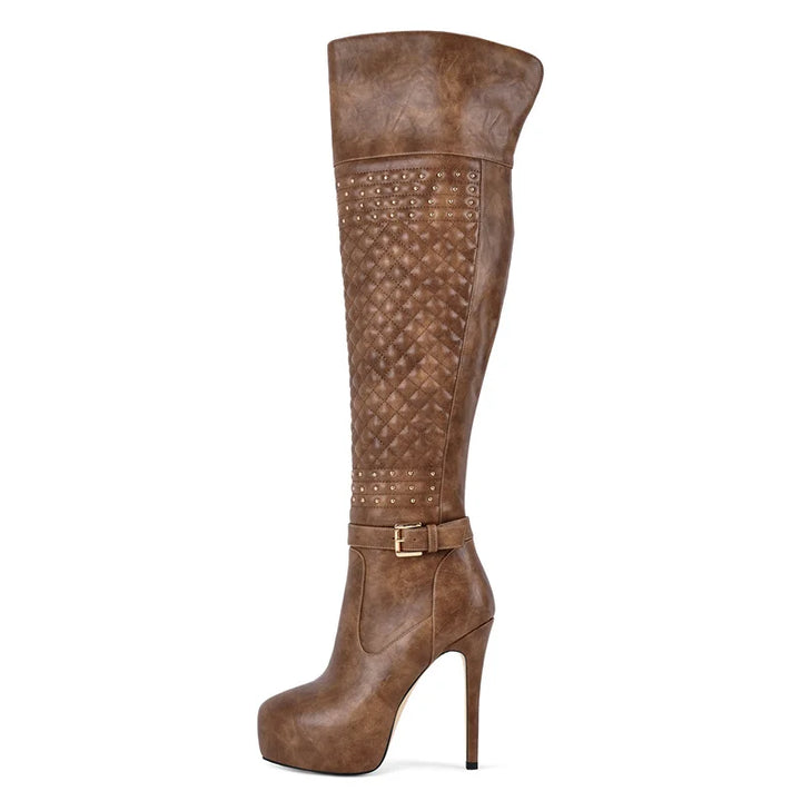 Brown over-the-knee boots with quilted shaft and buckle strap, stiletto heel.