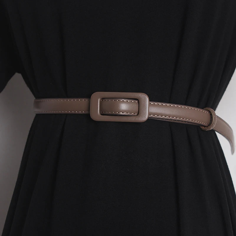 Women’s narrow genuine leather belt in taupe with rectangular brown-toned buckle