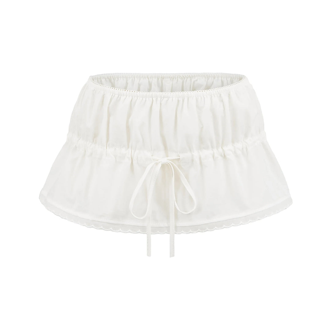 White ruffle mini skirt with elastic waist and center drawstring ties