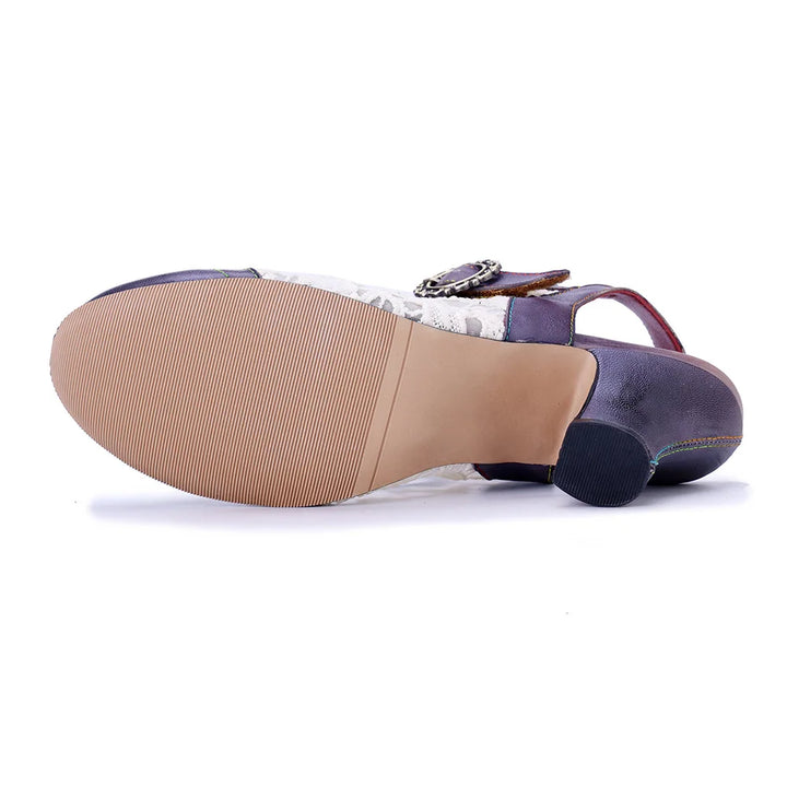 Women’s T-strap heel sandals, outsole view, stacked heel and white snake print upper