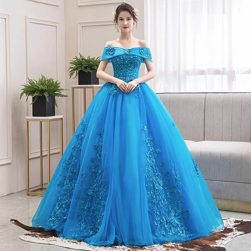 Lake blue one-shoulder party dress with off-shoulder neckline and full tulle skirt