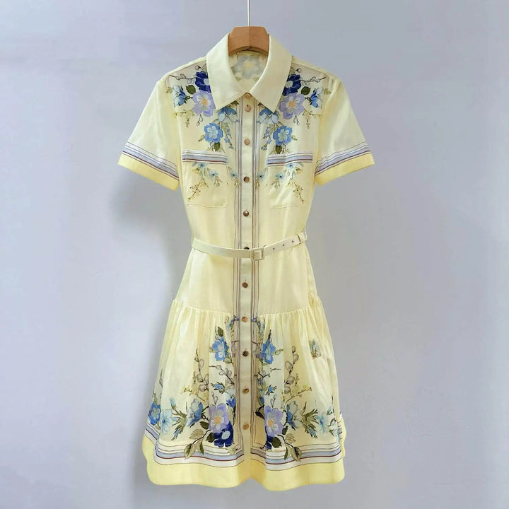 Yellow floral print short-sleeve mini dress on hanger, collared button-front, belt