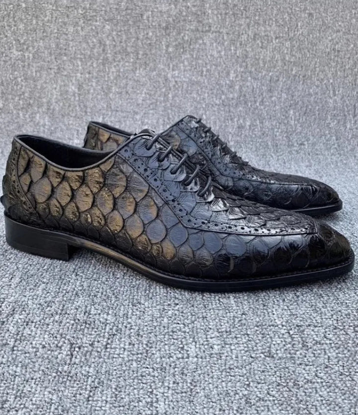 A pair of black snakeskin men&