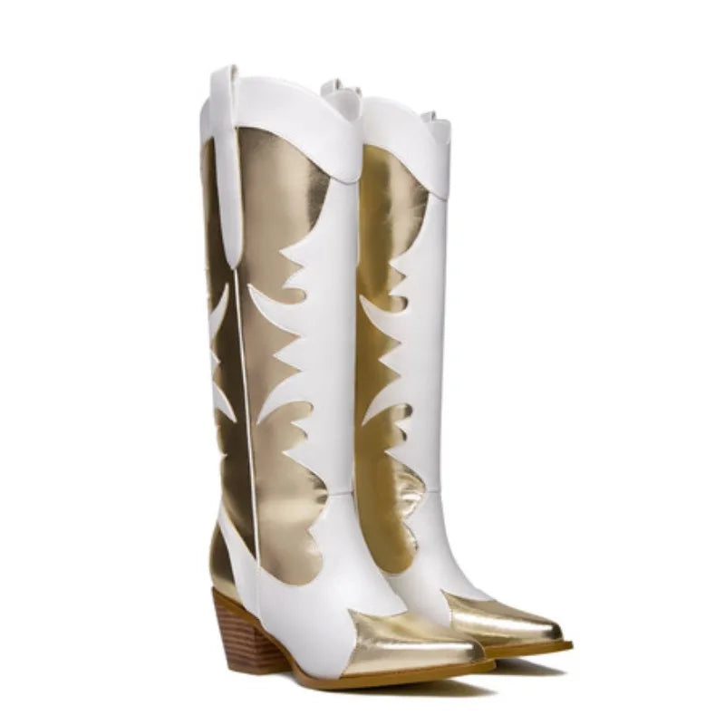 White knee-high boots with pointed toe, gold accents, scalloped floral cutouts, block heel