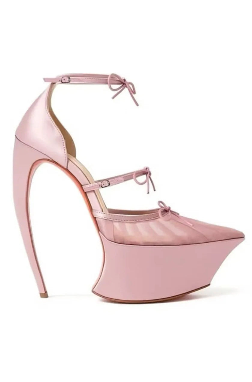 Pink high-heeled shoe with a pointed toe and thin straps on a white background