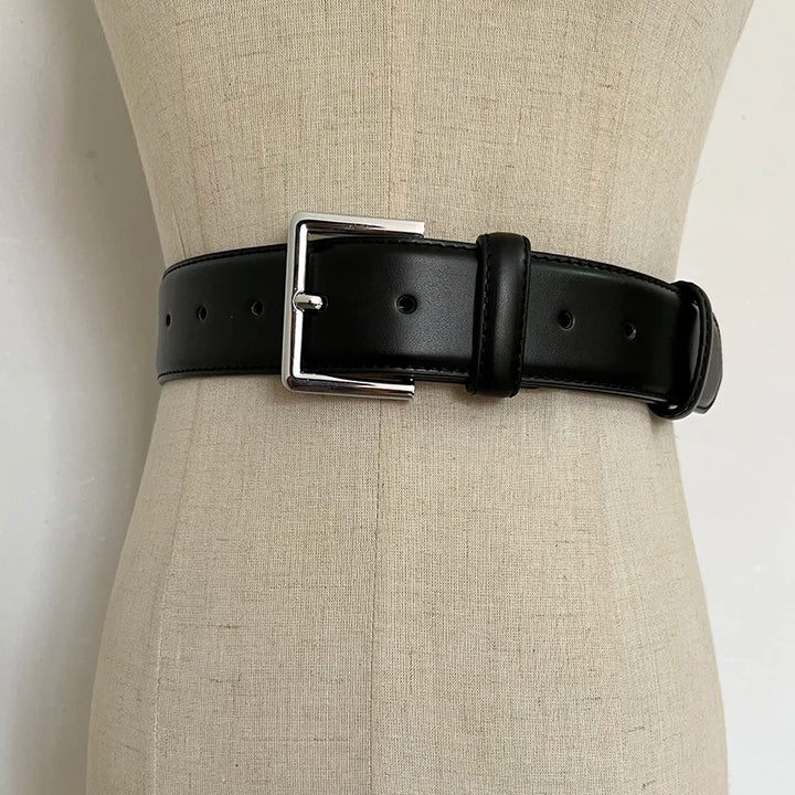 Black wide leather corset belt with rectangular buckle and punched adjustment holes