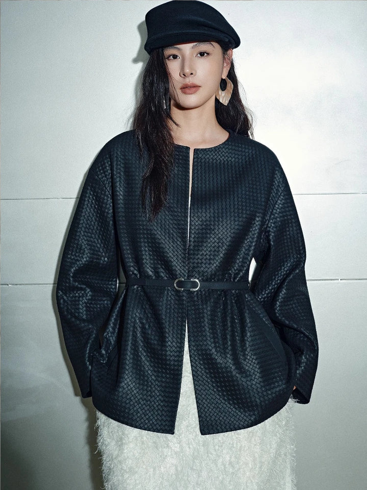 Black woven leather-look belted jacket with long sleeves and front zipper