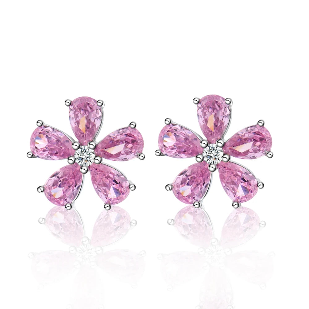 Pair of pink five-petal gemstone flower stud earrings with pear-shaped stones and silver backs