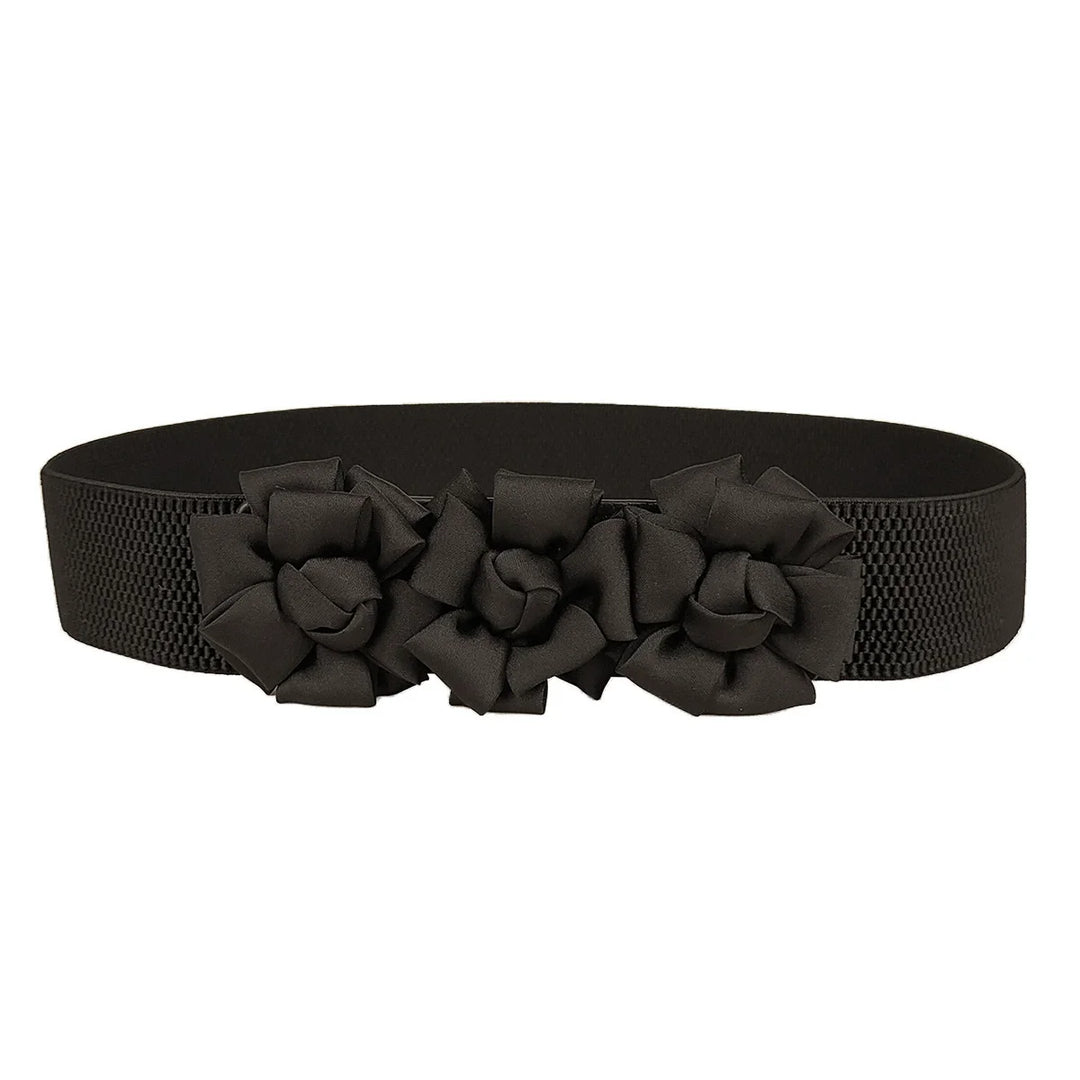 Black corset waist belt with three fabric flower appliques across the front